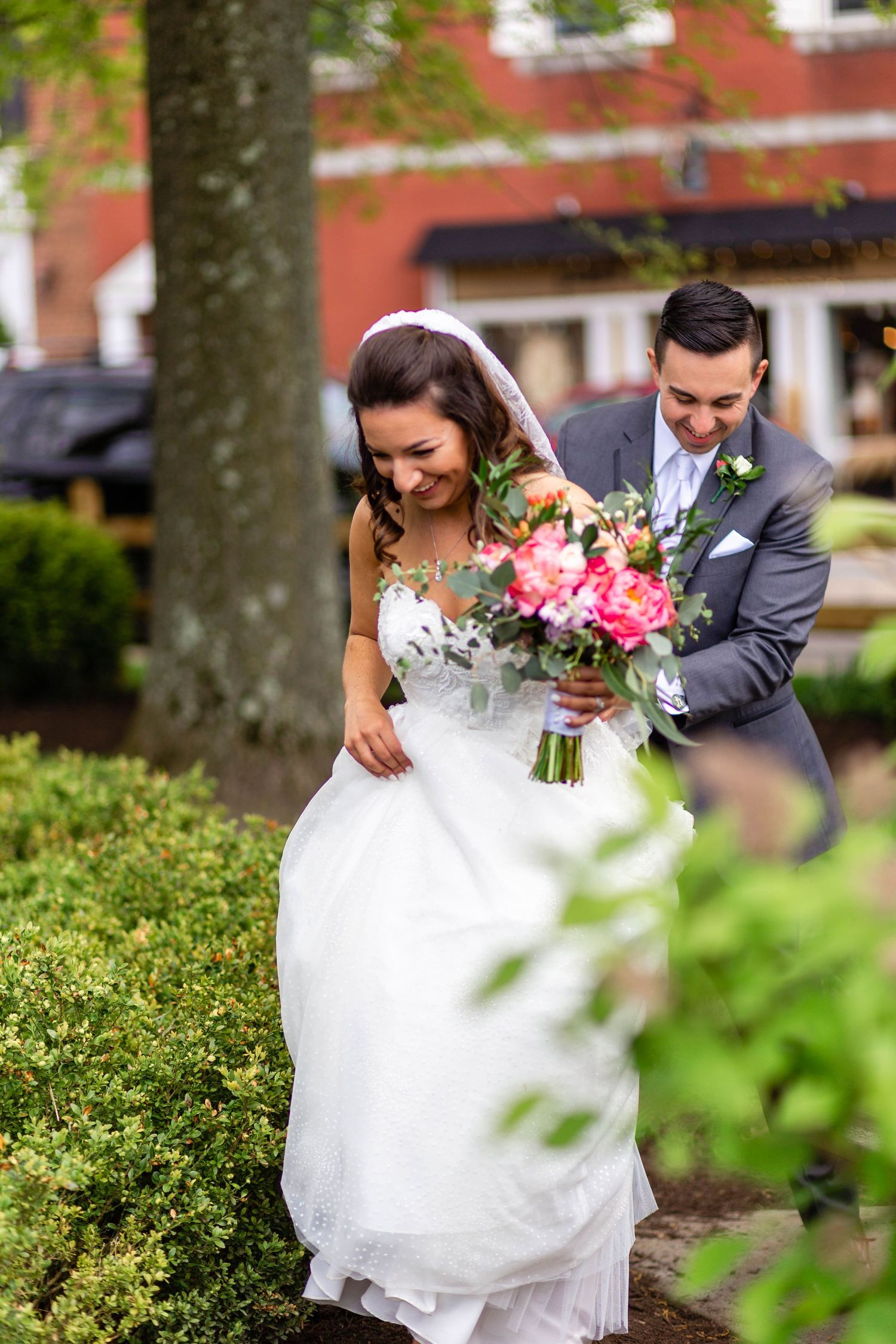 bride and groom walking to take photos