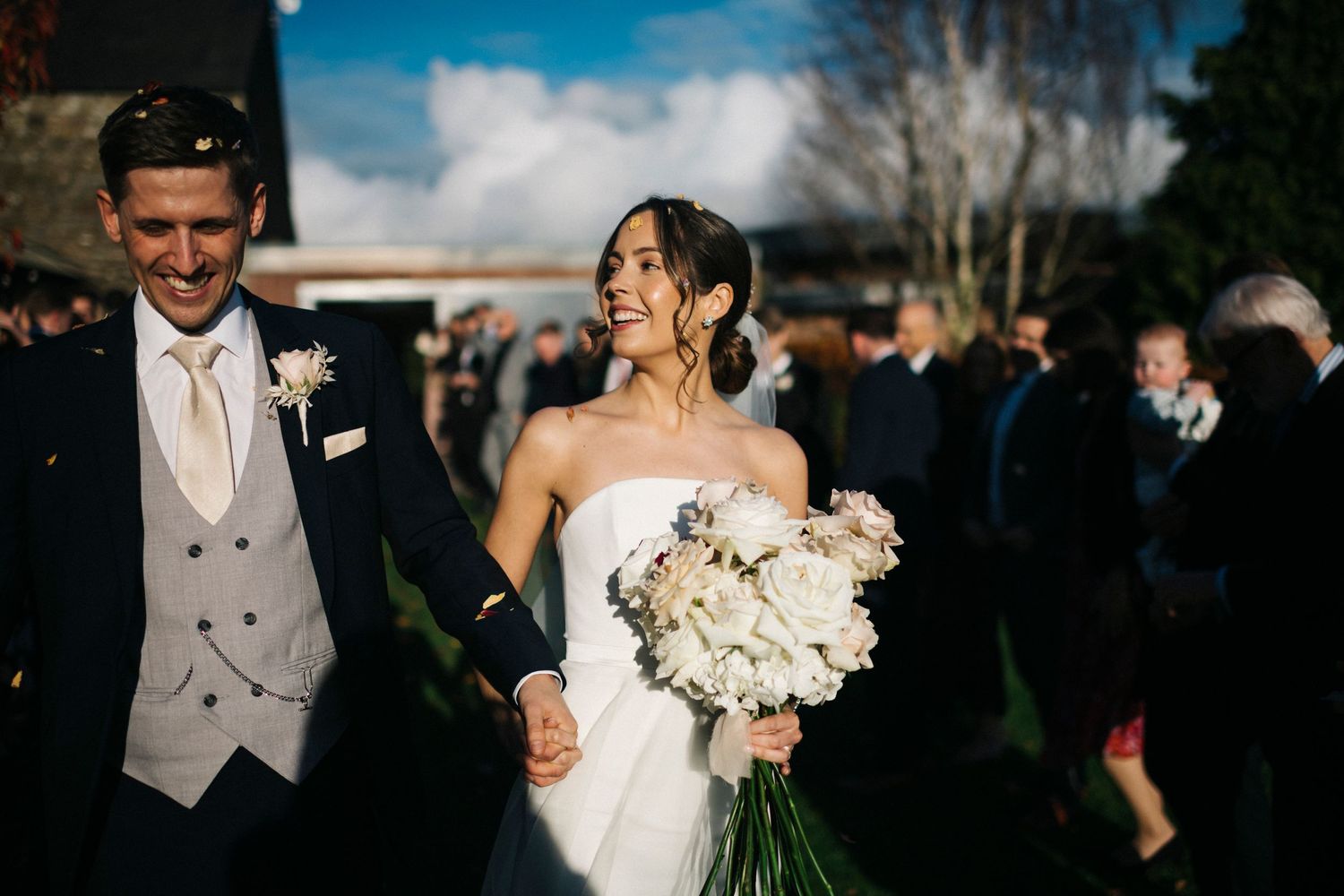 Elegant wedding couple shares romantic moments outdoors and indoors during their special celebration.