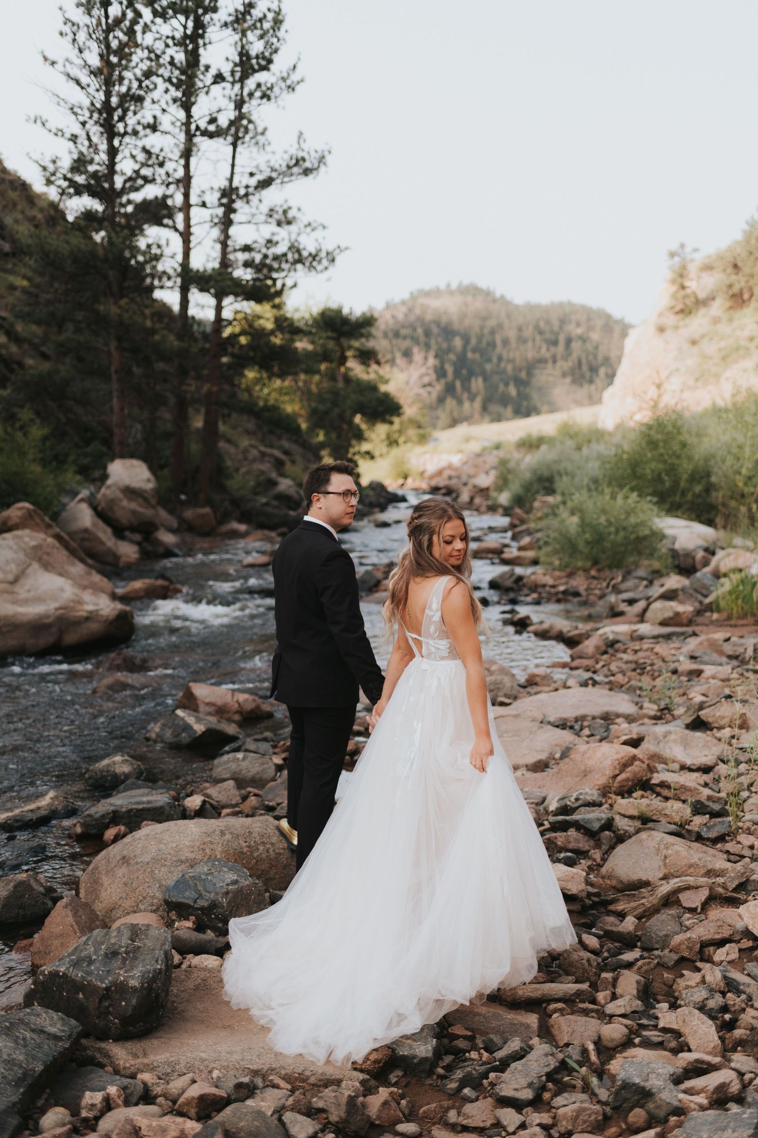 Couple during their elopement near Estes Park, Colorado with their destination wedding photographer