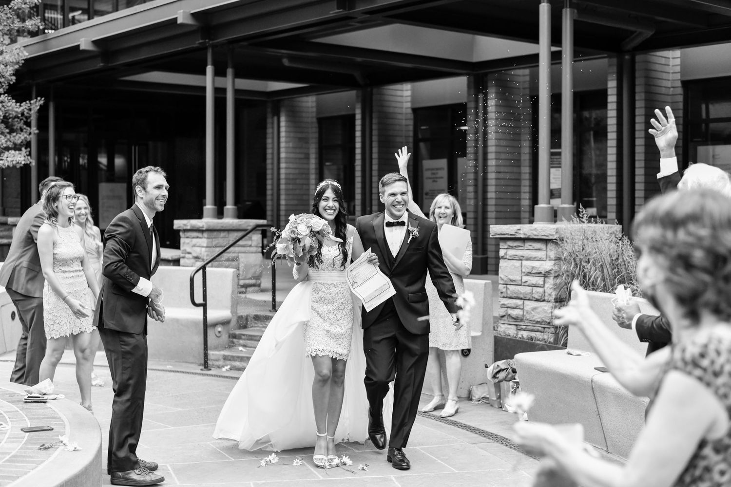 A series of black and white wedding reception moments captured in sequence.