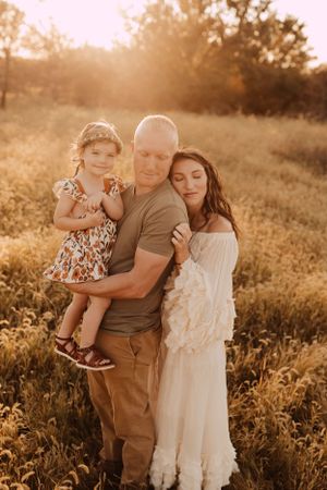 natural family photos in a field