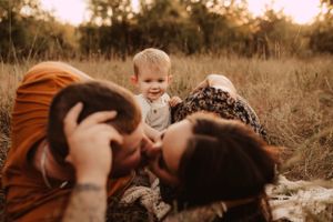 mom and dad have a moment during family photography session