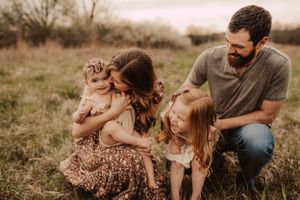 laughing and kisses with family photography session