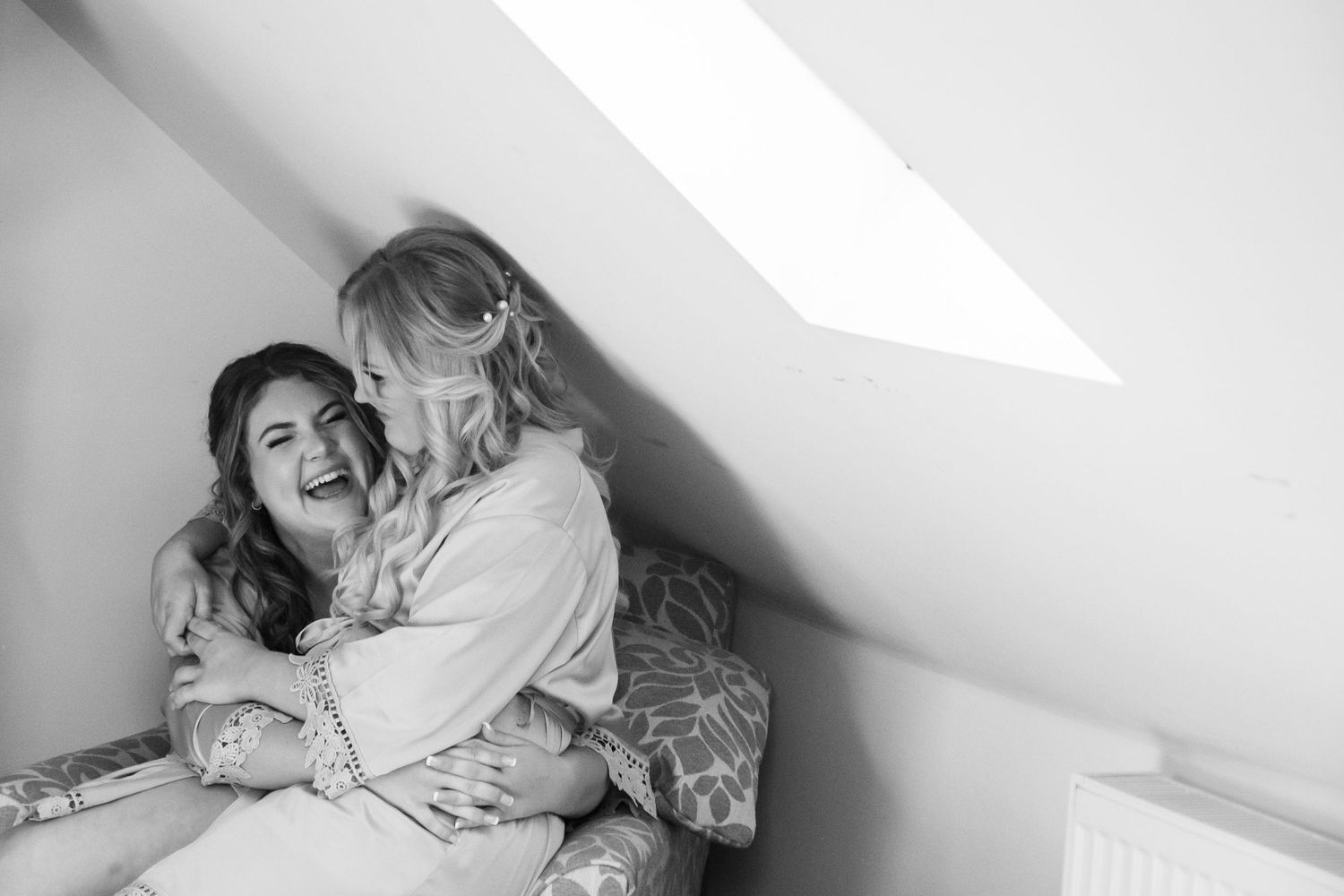 Tender moments captured in minimalist black and white wedding photography.