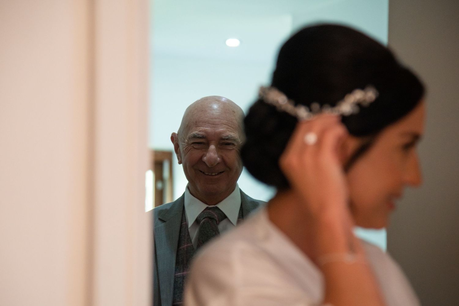 Wedding preparations and candid moments captured in soft natural light.