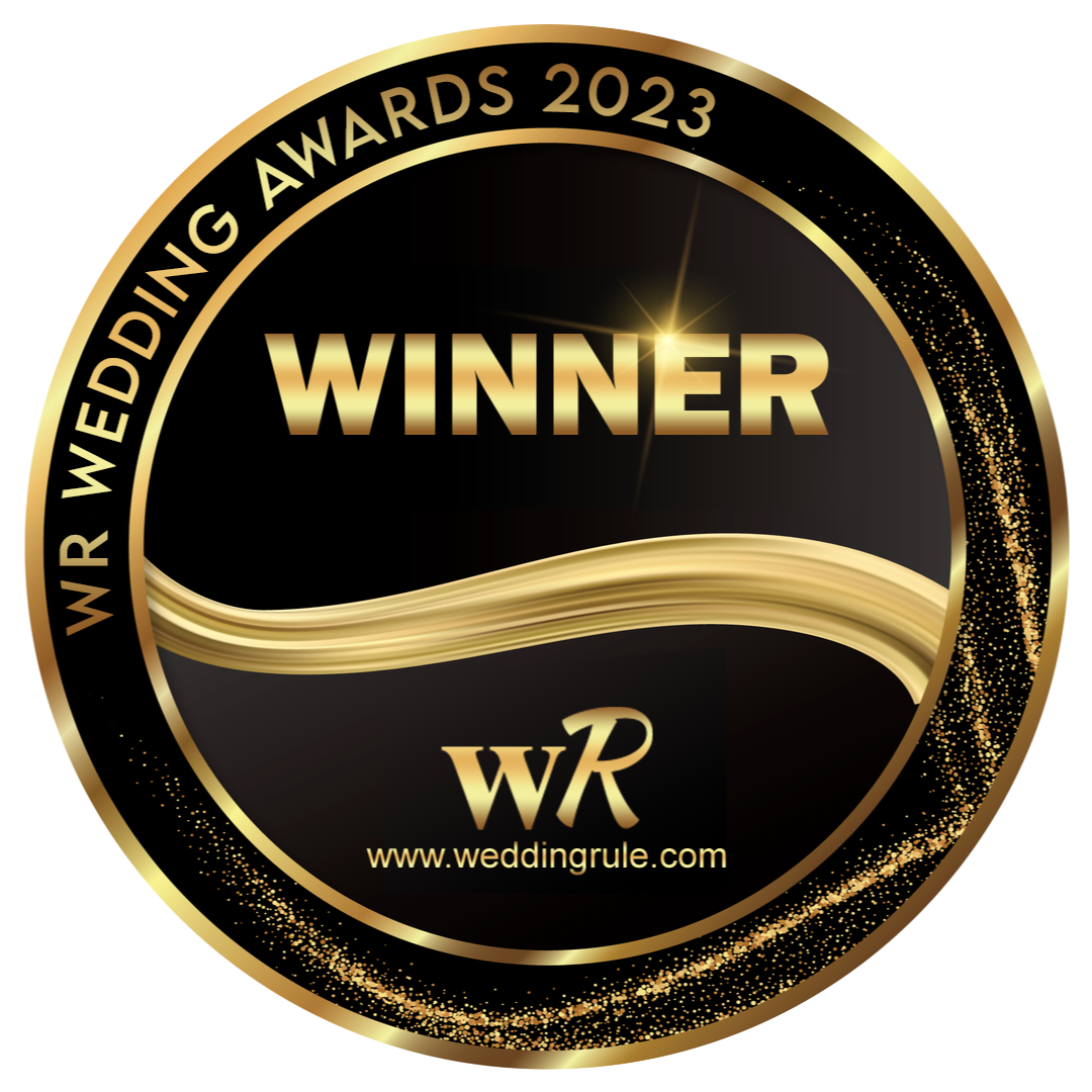 Luxurious black and gold award badges for WeddingRule 2023 winners.