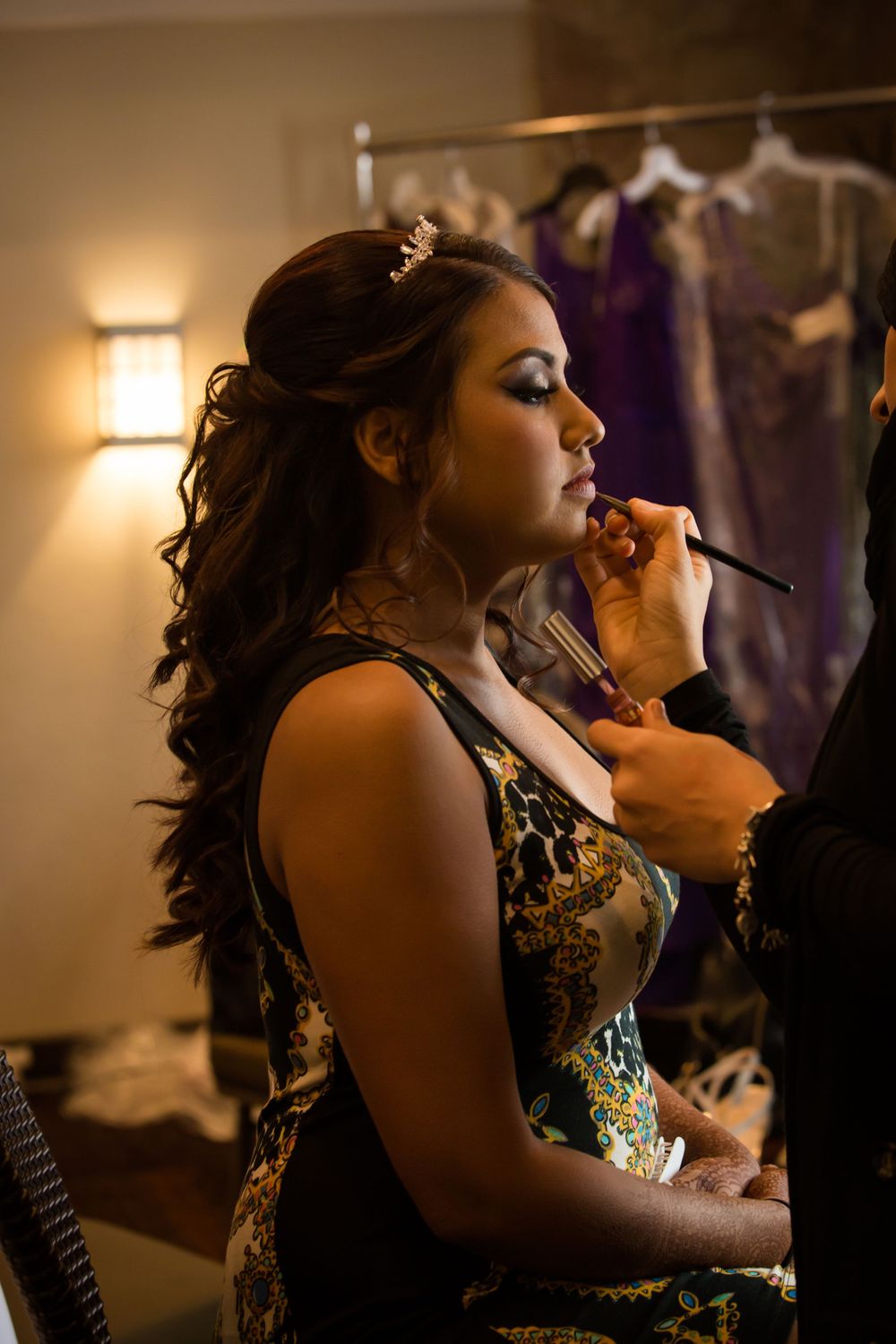 Candid moments captured during an evening celebration with warm lighting.