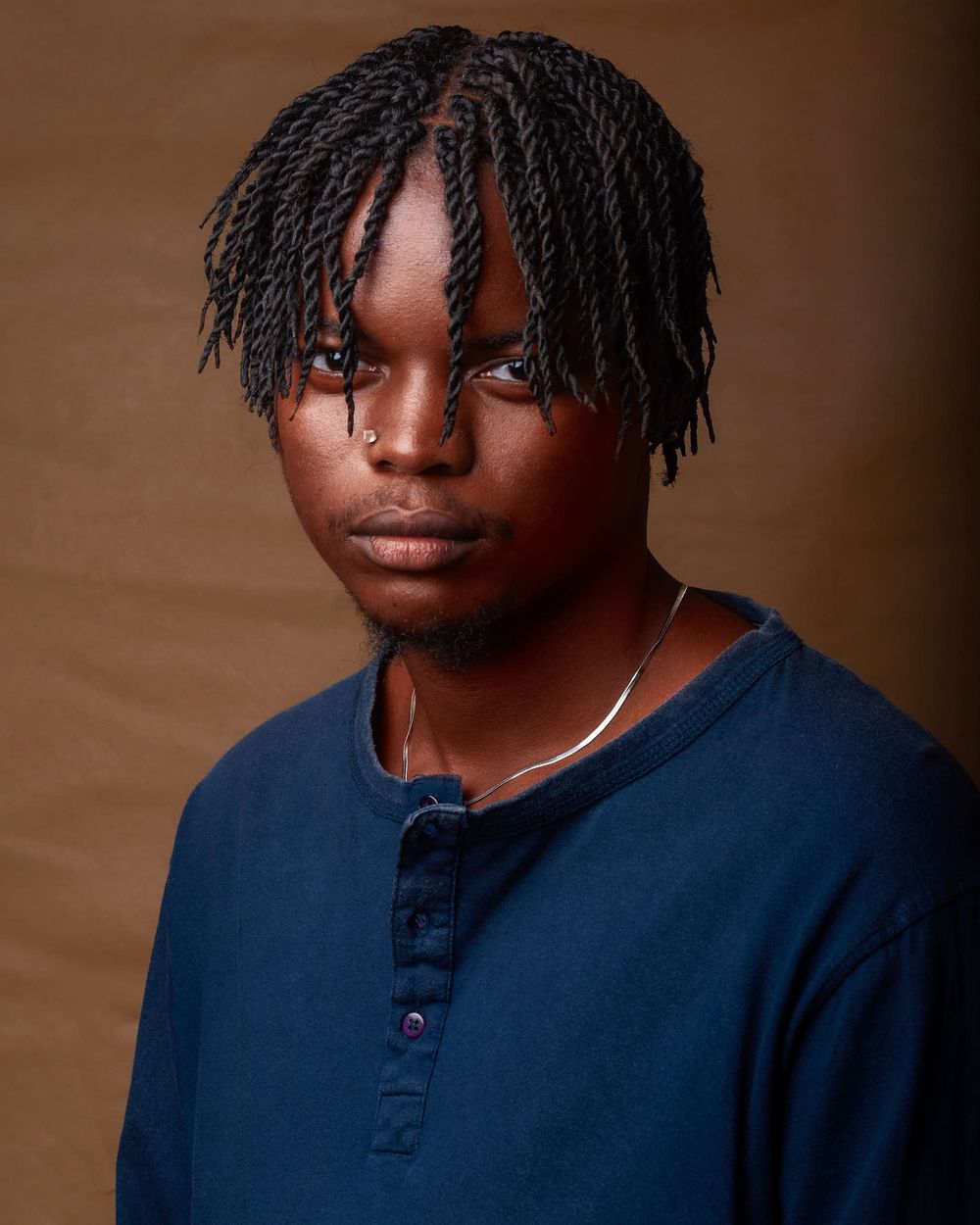 headshot of a young nigerian artiste