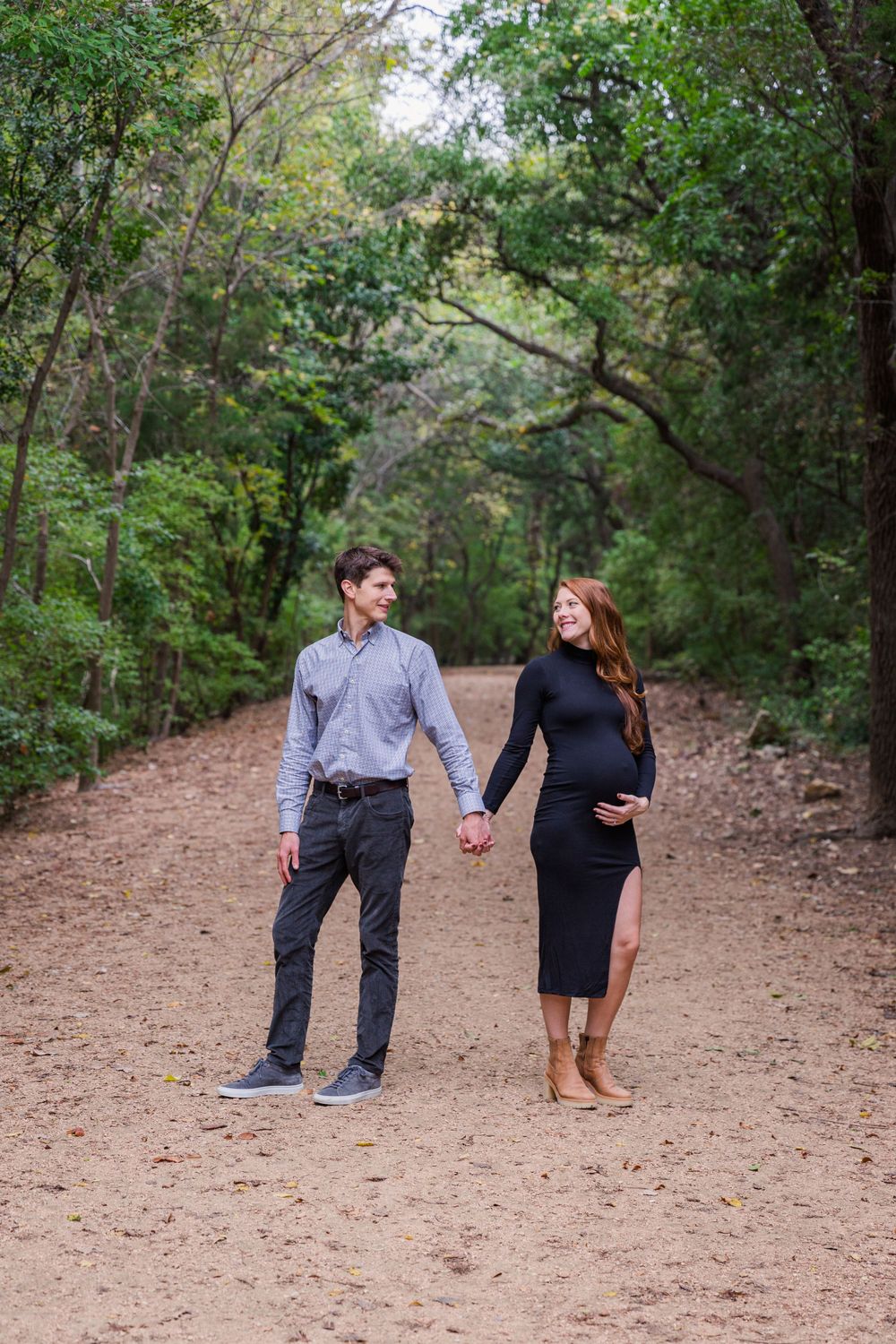 maternity portrait in tree lined path at Red Bud Isle