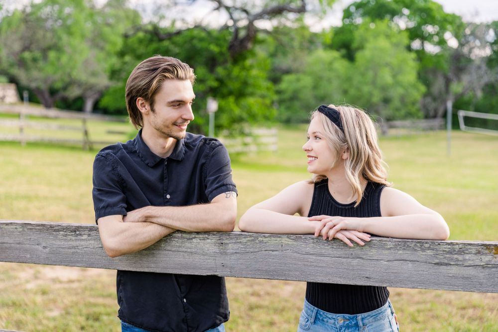 farm fence engagement photo