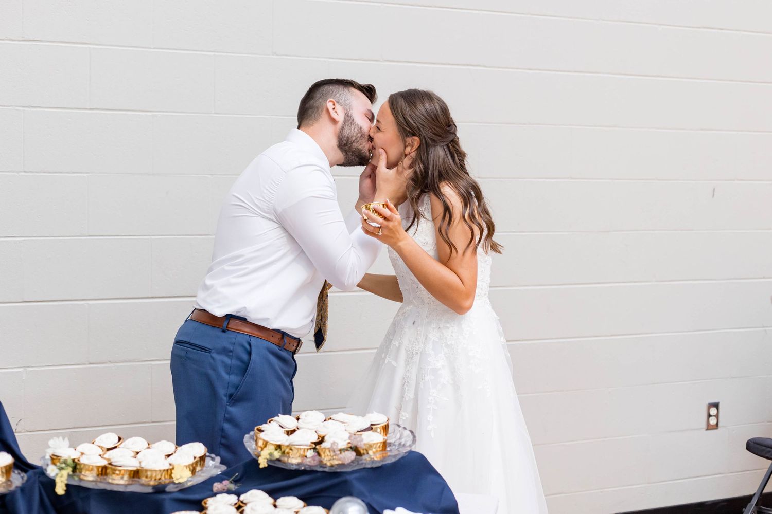 groom kisses bride