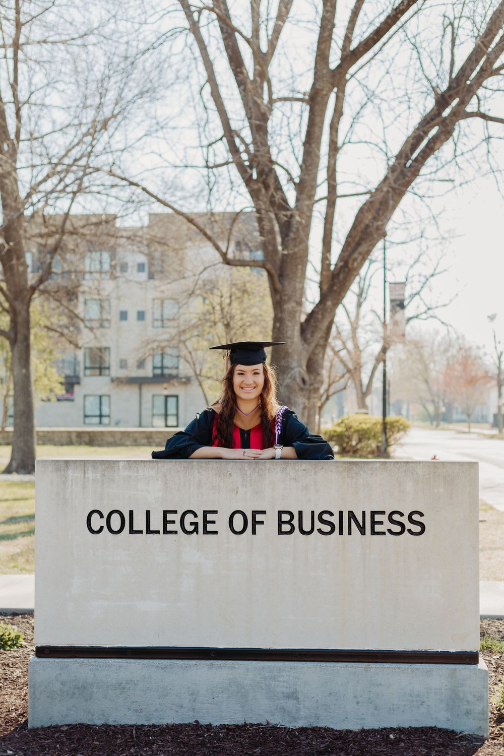 Senior photos in Manhattan, Kansas by portrait photographer – golden hour outdoor session with natural, candid senior portraits.