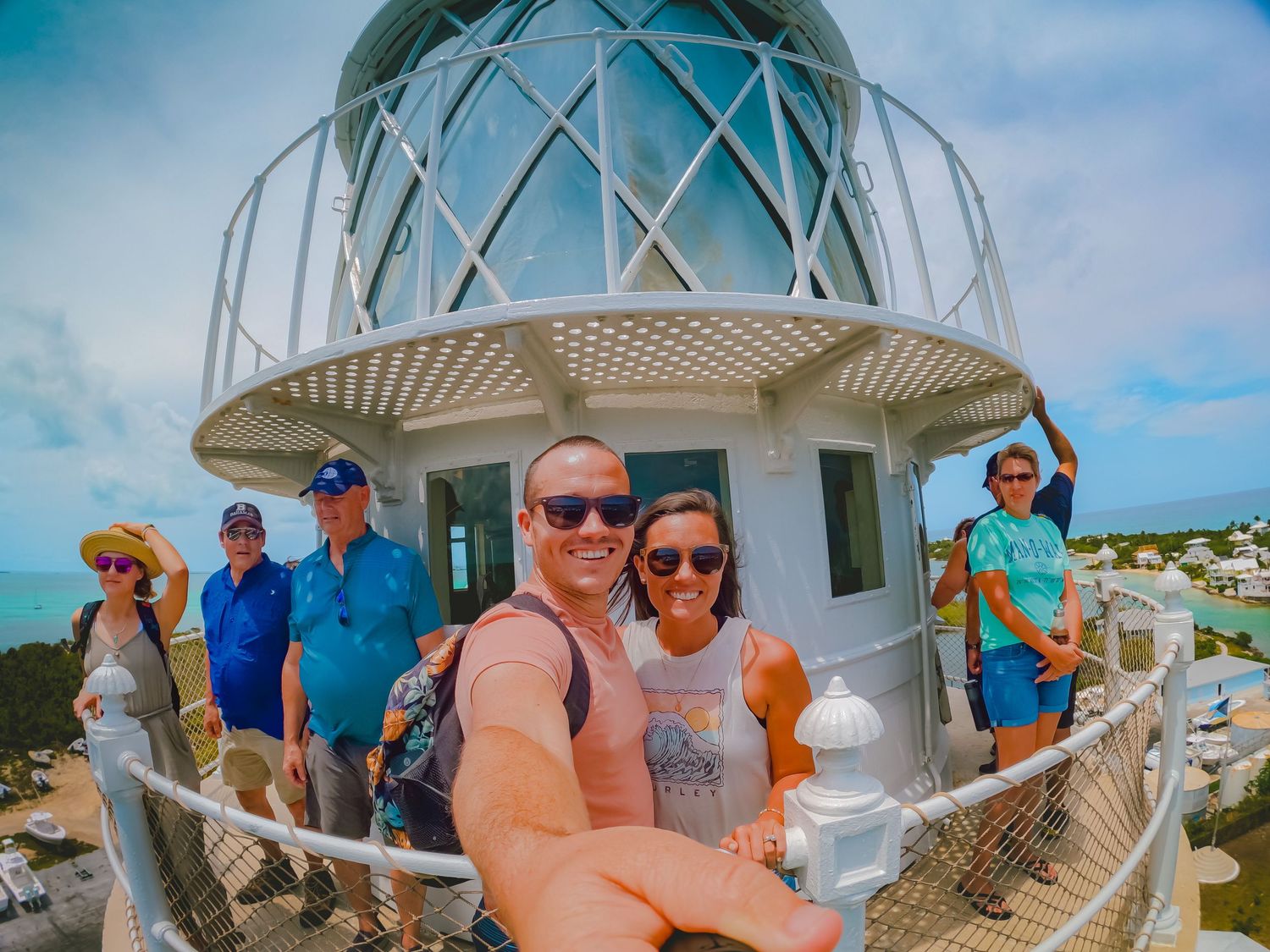 JJ & Ashley Lain take a picture with their GoPro on top of the Elbow Reef Lighthouse in The Bahamas.