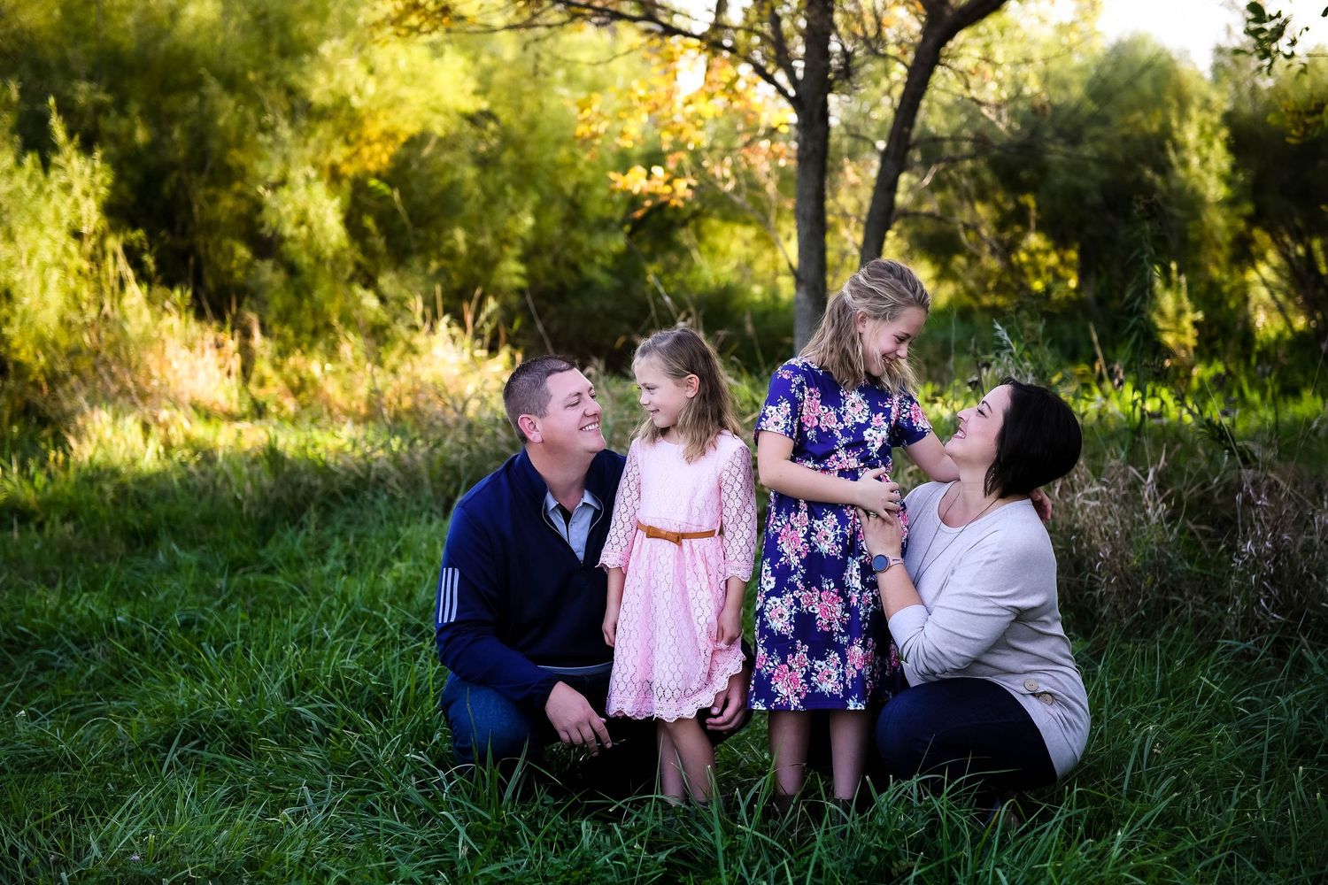 family of four spending time together