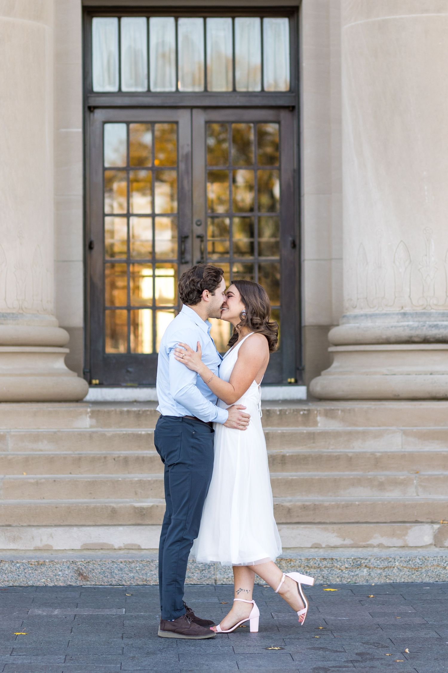 Engaged couple at Nelson-Atkins Museum
