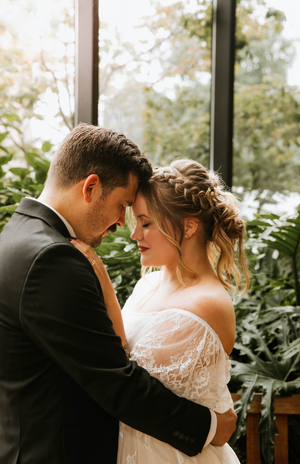 Intimate wedding portrait at a scenic venue by Branson, MO Photographer L. Ballenger Photography.