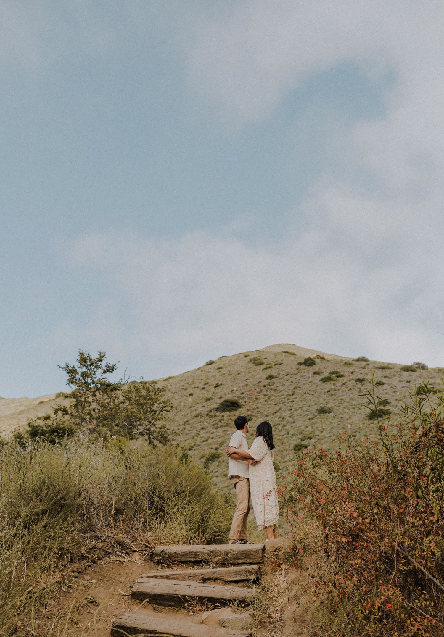 E. Noelle Photography couple engagement in the Los Angeles Malibu hills looking out at mountain