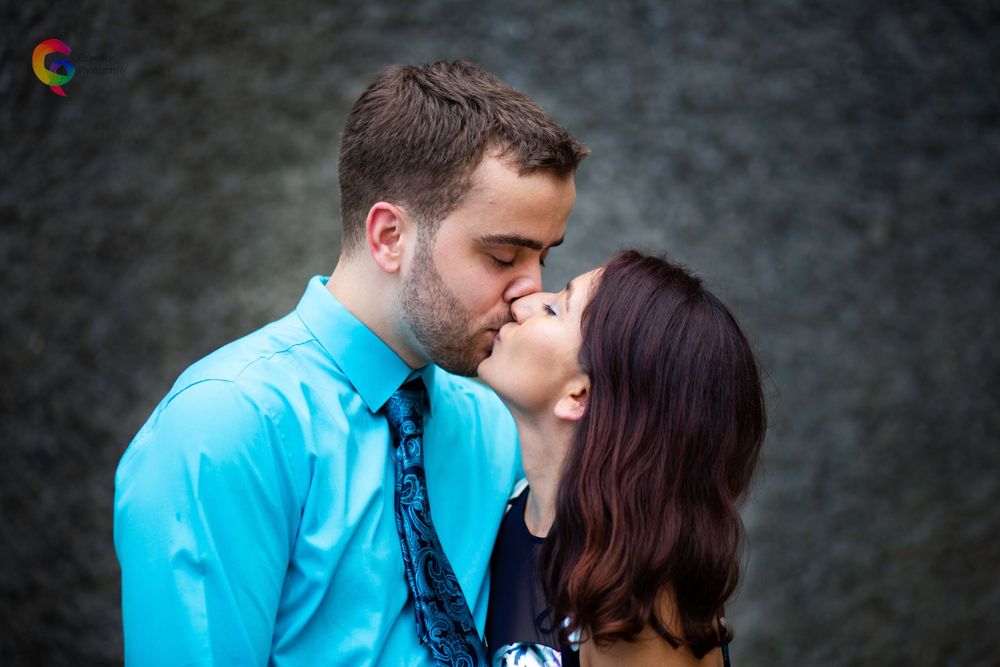 Candid Engagement Photo Waterfall The Bell Tower on 34th