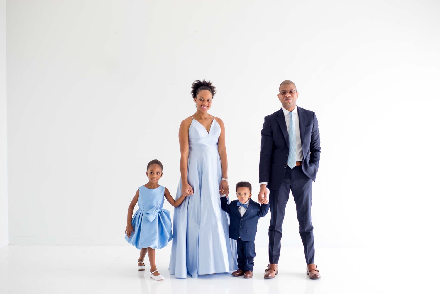 family of four white studio in houston texas
