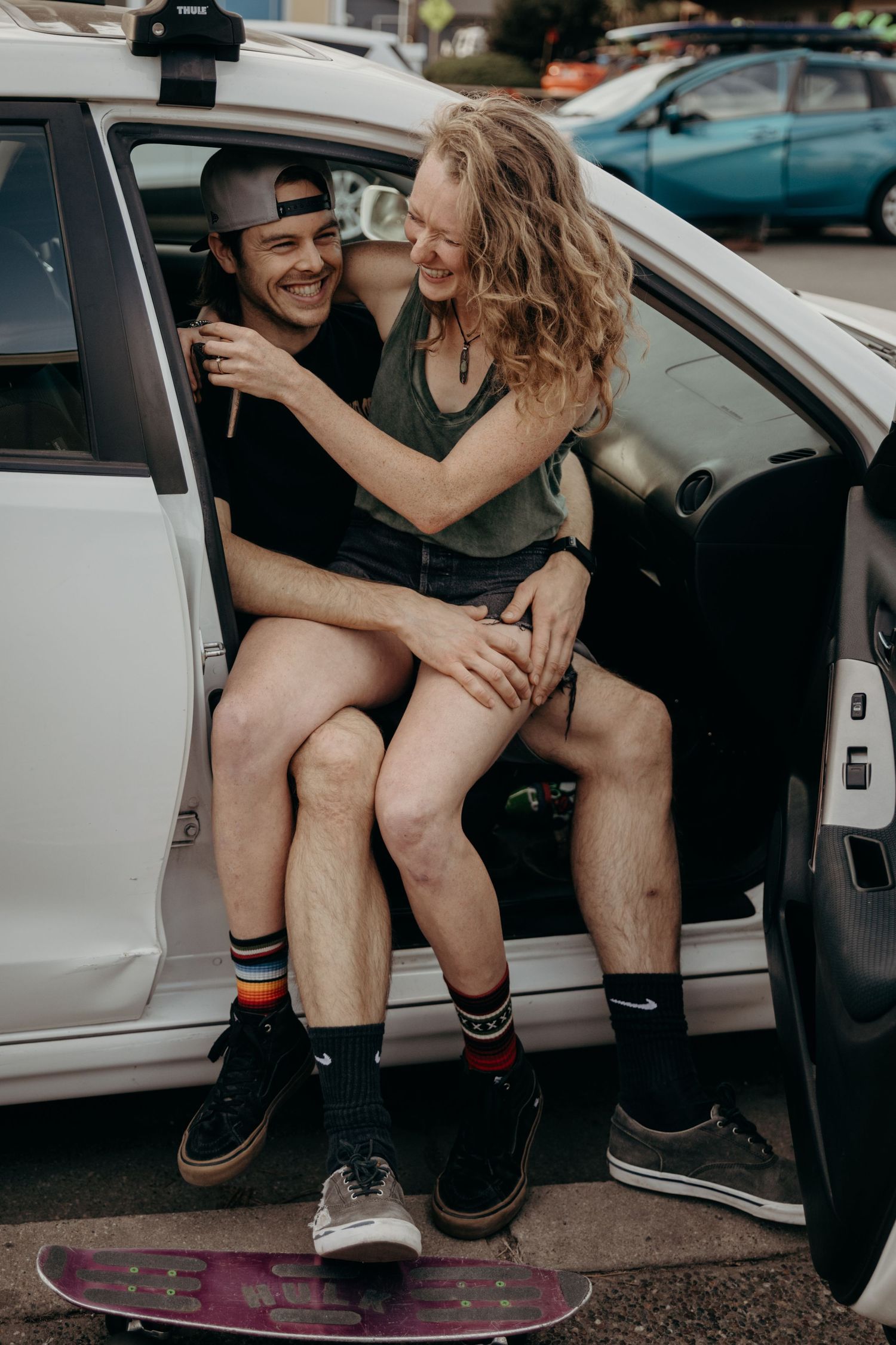 skateboard-beach-aesthetic-lifestyle-santa-cruz-vibe-couple-sitting-on-lap