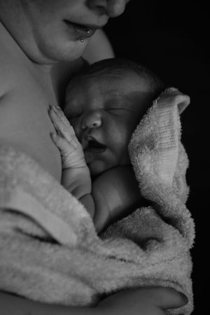 "Preserving the miracle of birth: Captivating and emotional birth photography that beautifully captures the precious mom