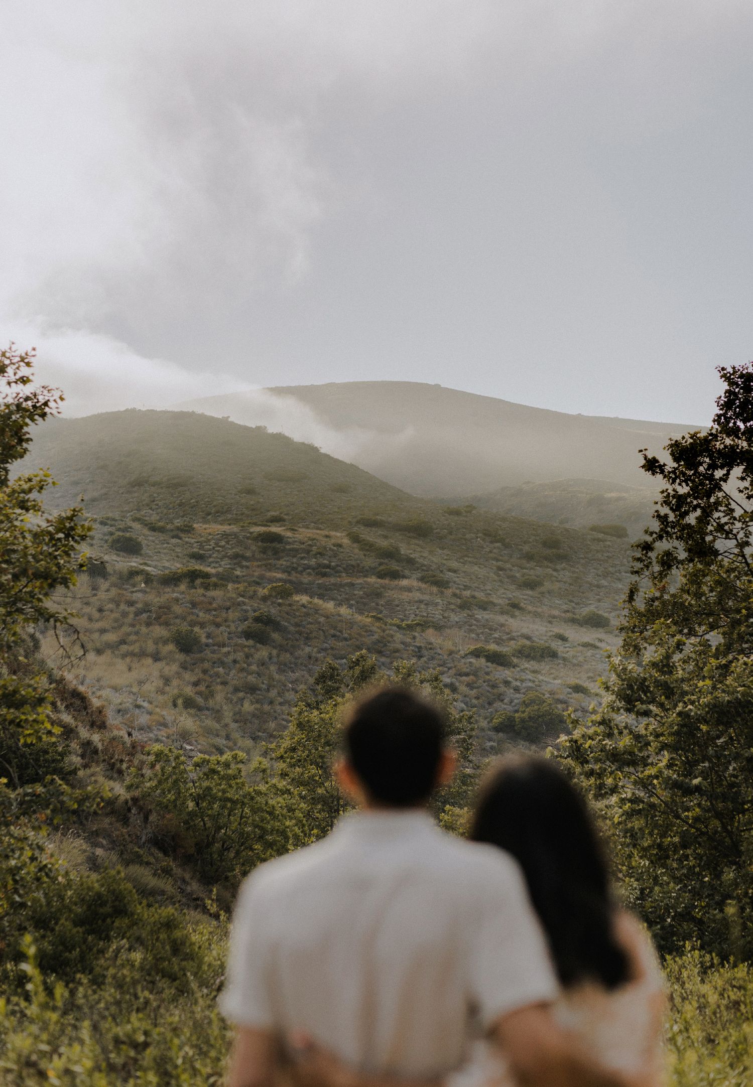 E. Noelle Photography couple engagement in the Los Angeles Malibu hills, people are blurry background is in focus