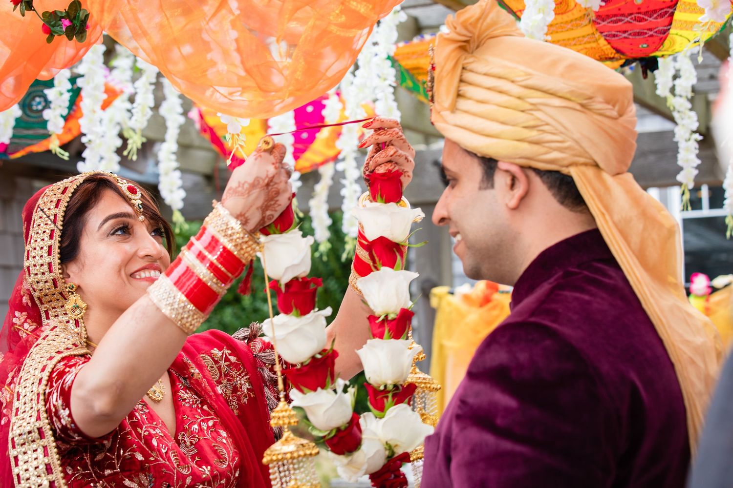 Hindu Bride and Groom exchanging their flower varmala
