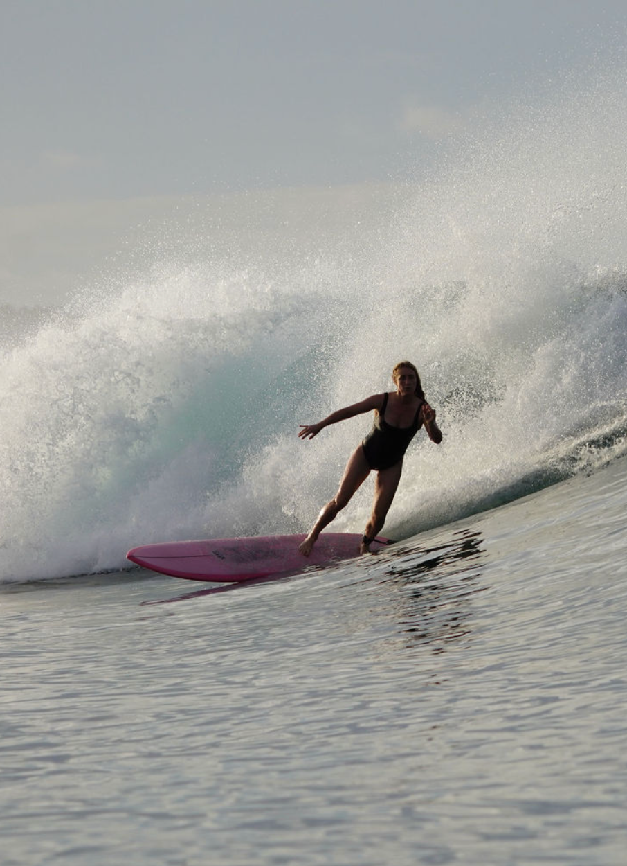 Photo of surfer on a wave