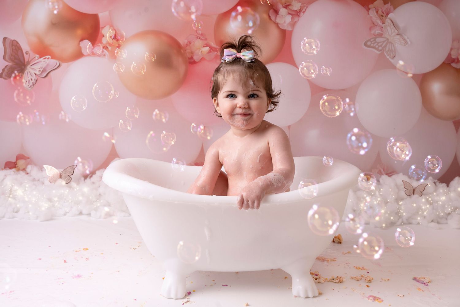after the cake smash a fun session in the splash bath