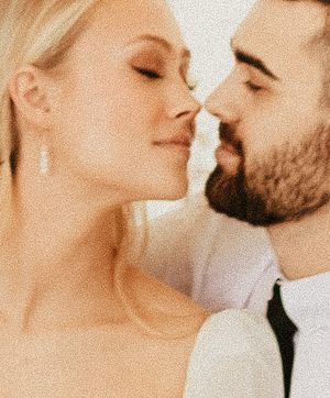 Intimate close-up portrait of couple sharing tender moment.