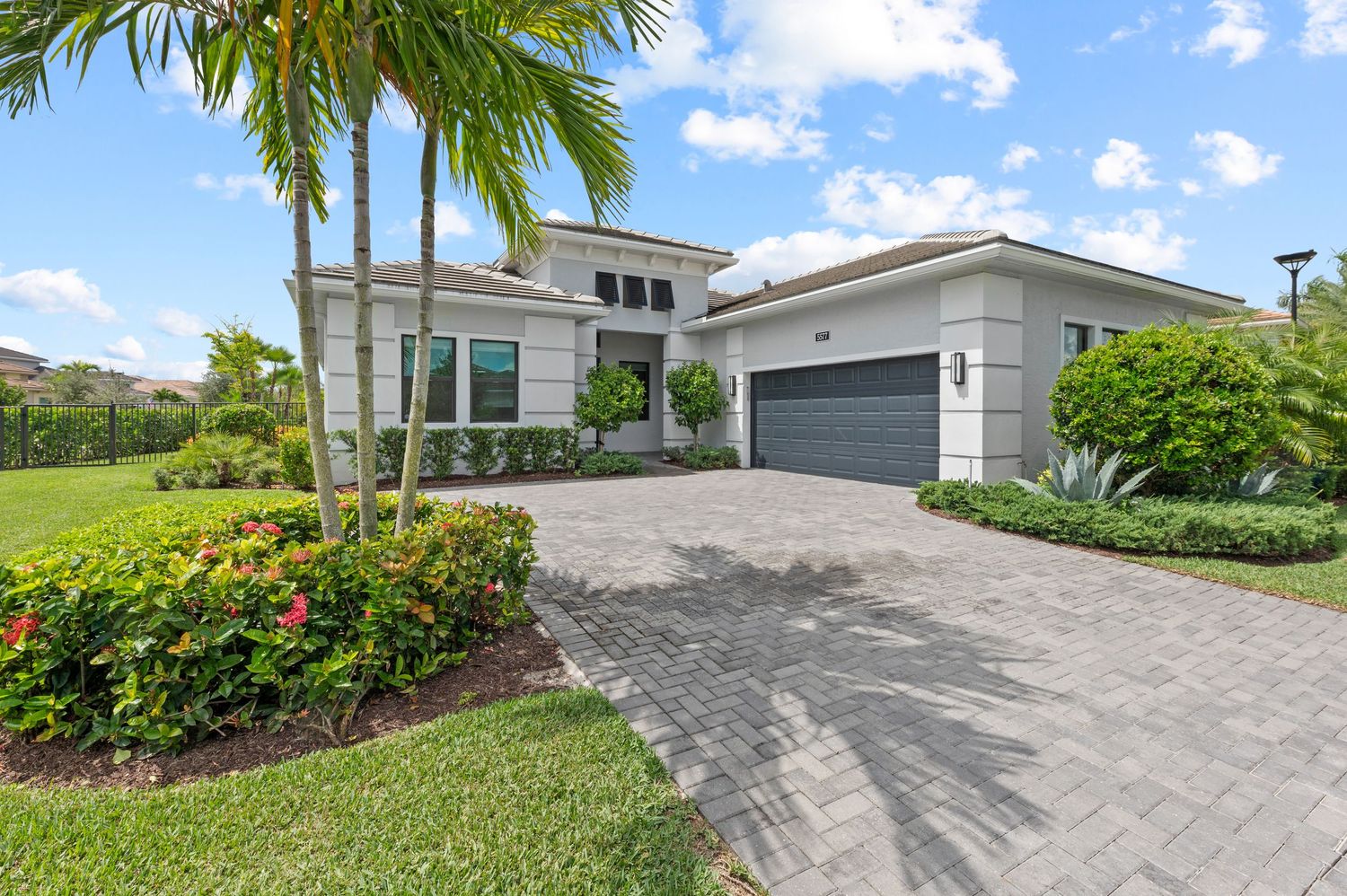 real estate photography for this fully renovated house in Weston with a perfect manicured front landscape Real estate photographer