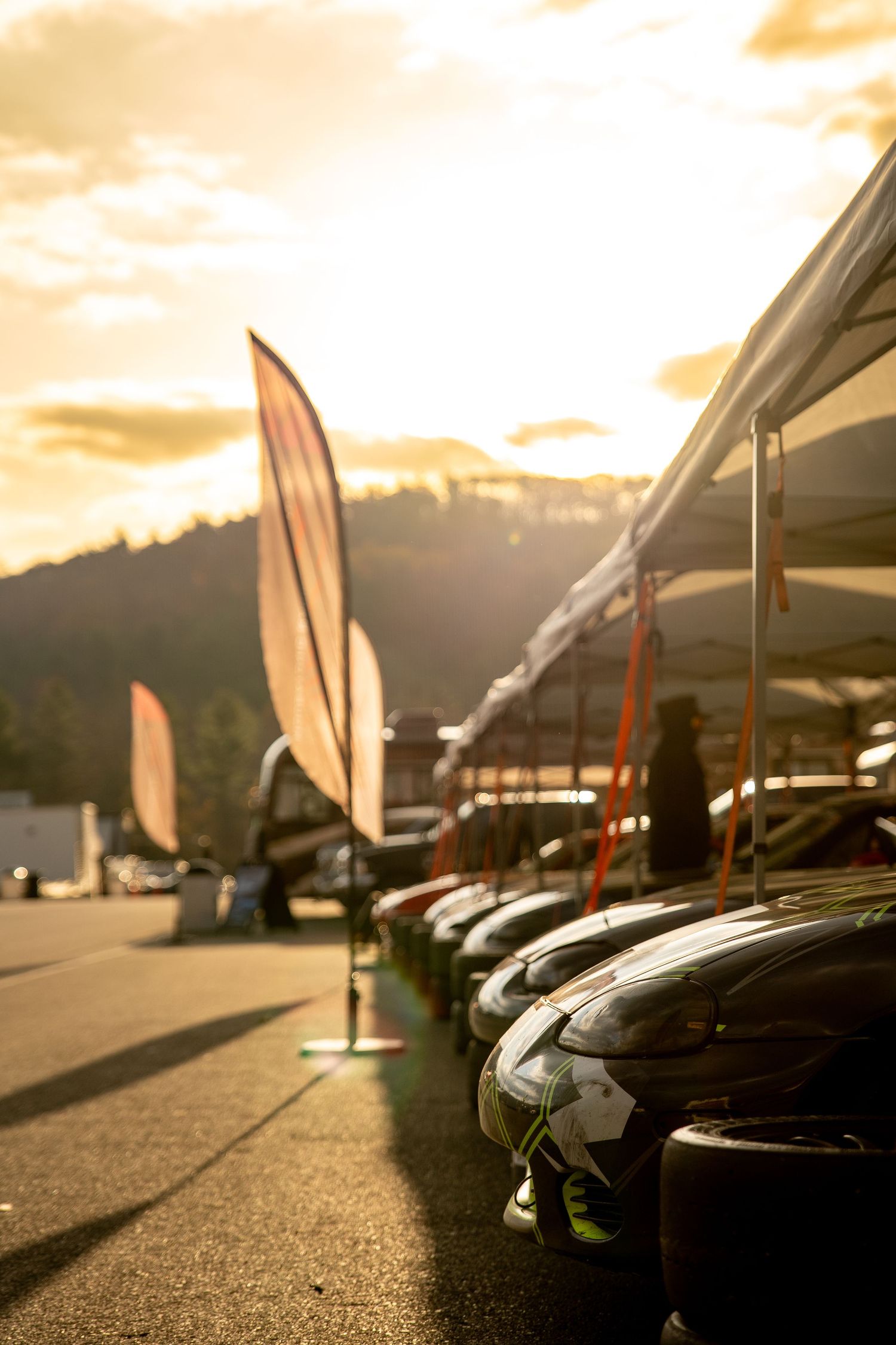 "Trackside moments captured in motion—authentic race day photography with pit lane energy and raw motorsport emotion."
