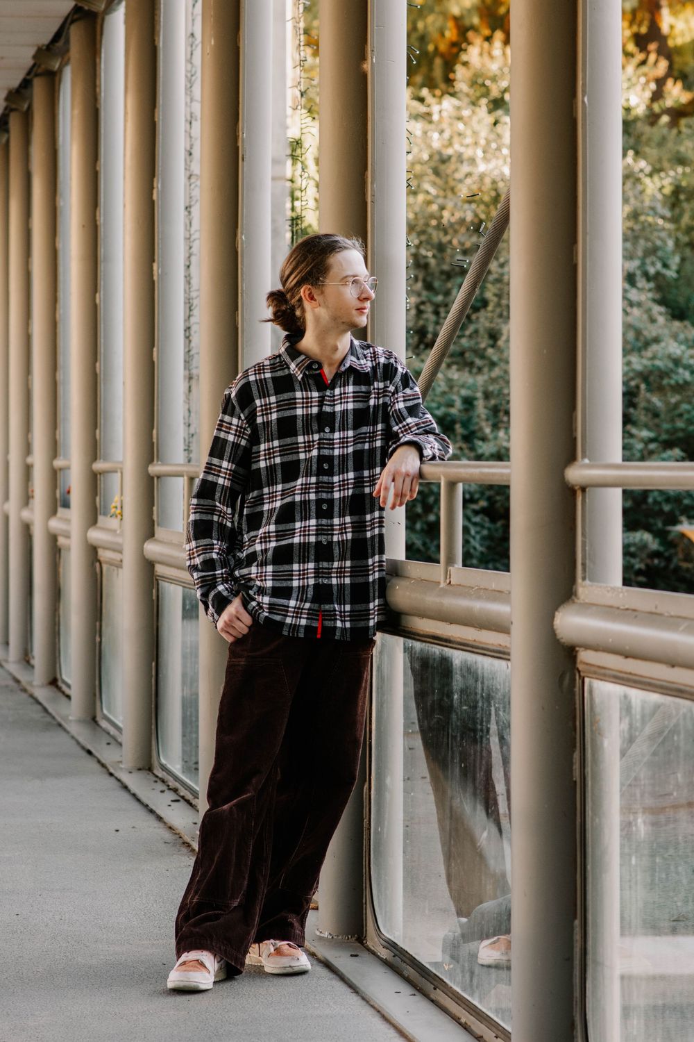senior posing on the bridge at Myriad Botanical Gardens in Oklahoma City, Oklahoma.