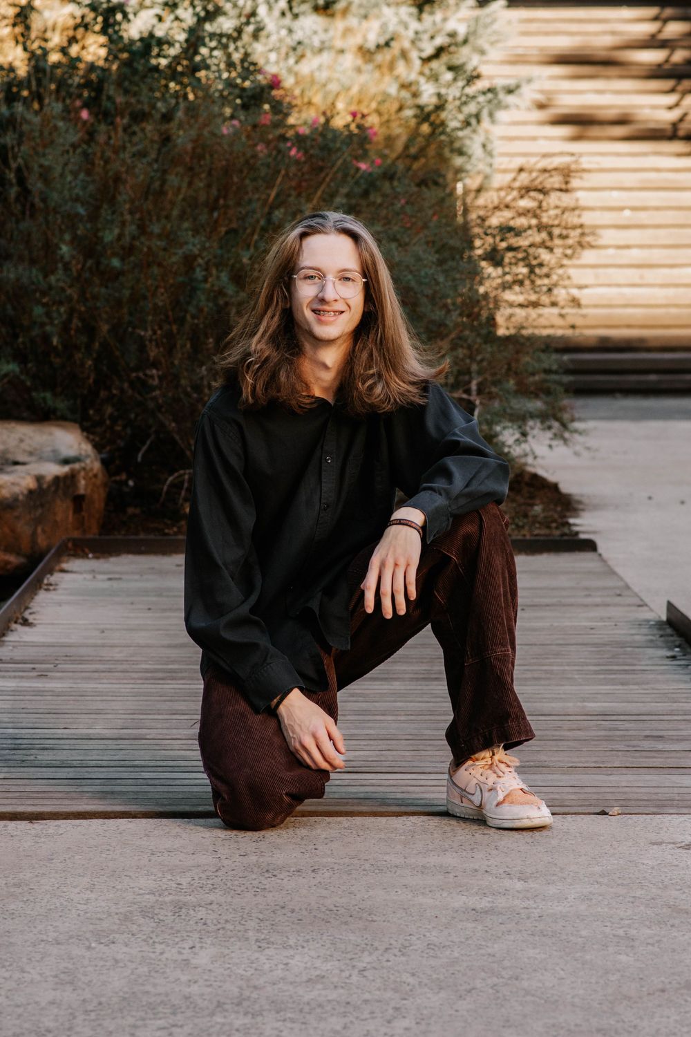 senior posing at Myriad Botanical Gardens in Oklahoma City, Oklahoma