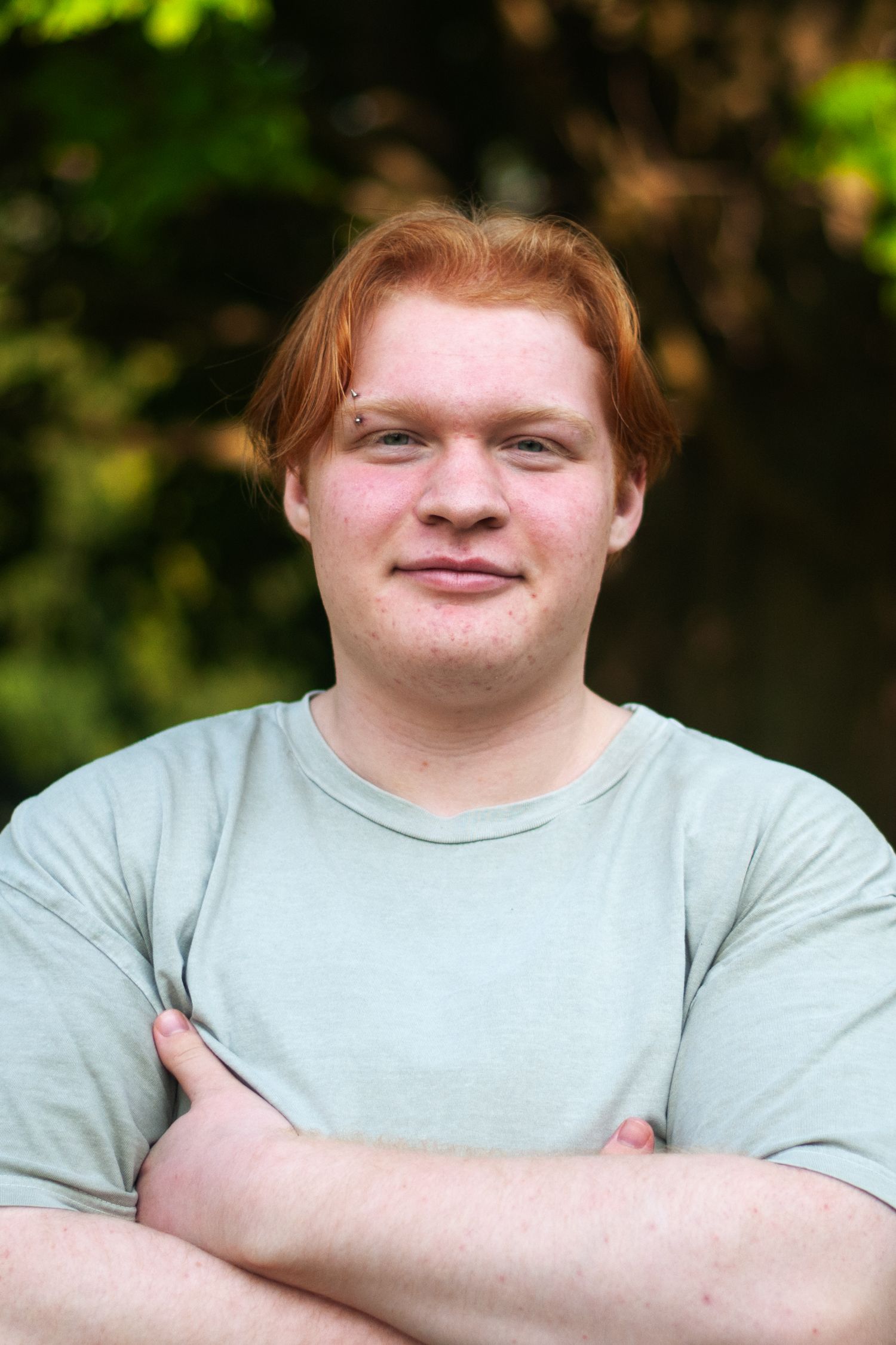 A headshot portrait of a senior boy