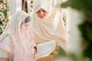 Ethereal bridal portraits with flowing white veils and soft pink accents.