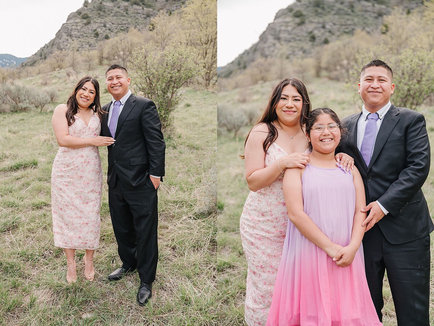 A couple and young girl in formal attire pose together against a scenic mountain backdrop on a sunny day.