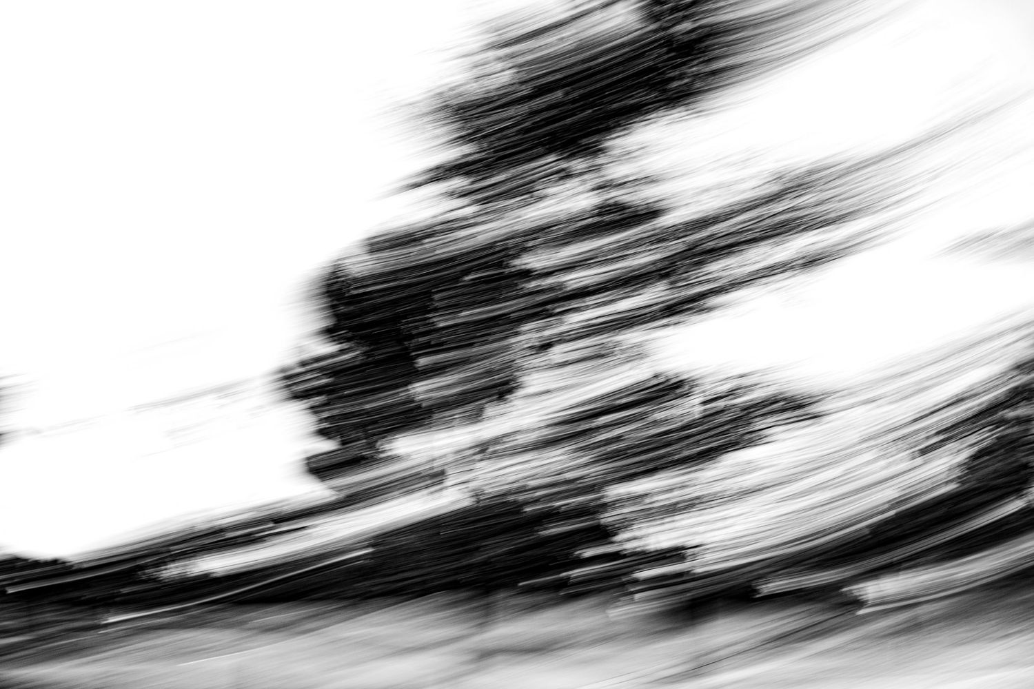High contrast abstract composition with diagonal streaks of black and white.