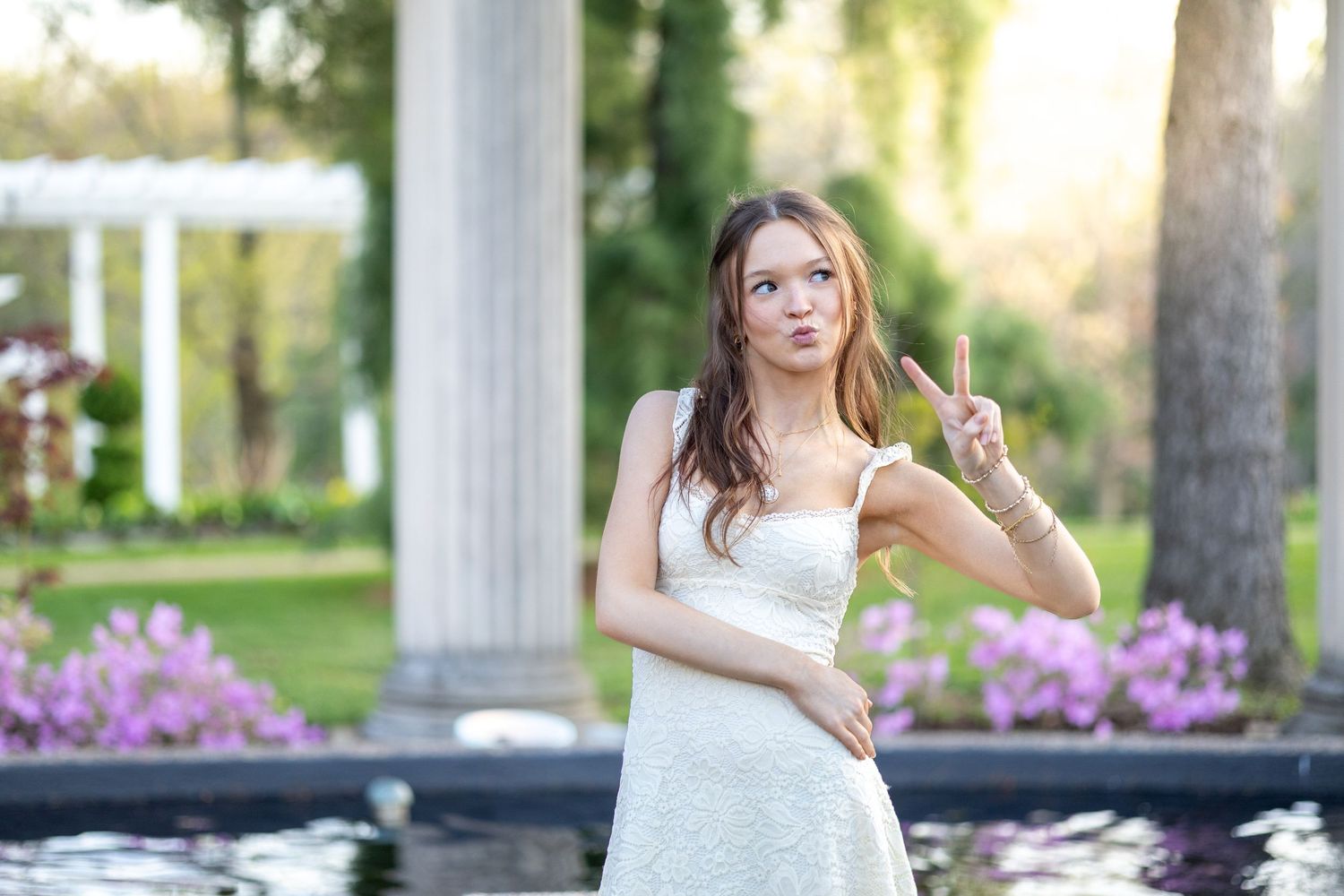 Springfield, IL senior photographer captures a senior showing personality during a session in Central, IL
