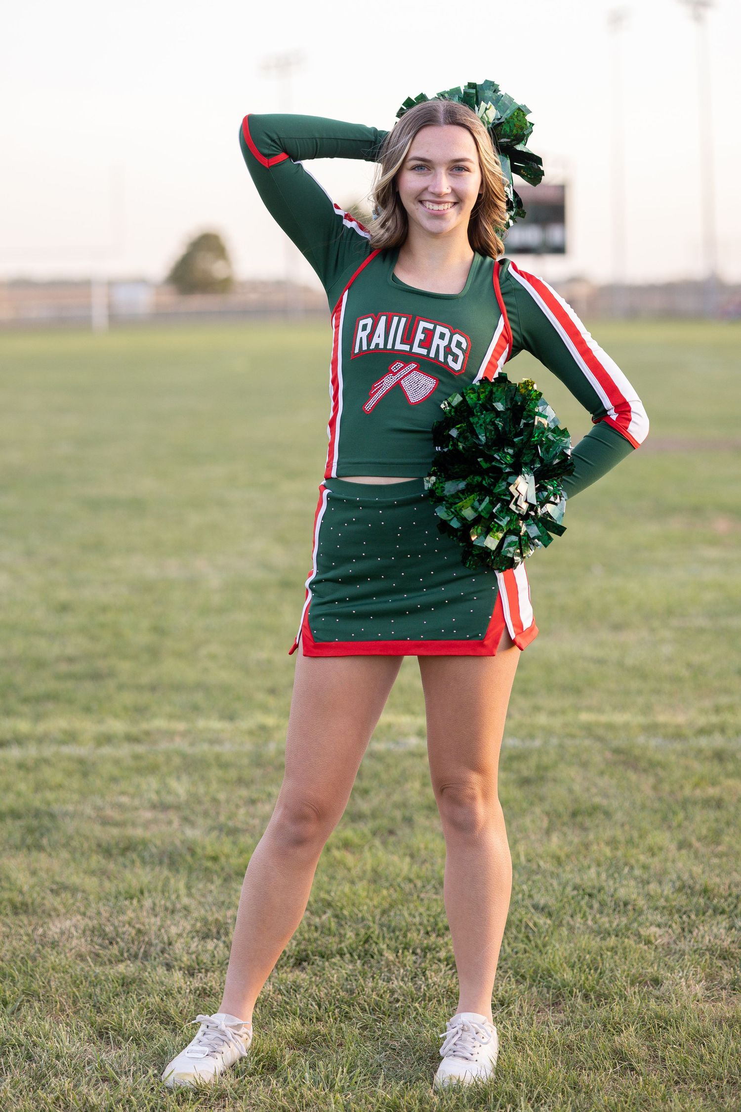 Springfield, IL senior photographer captures a senior cheerleader posing during a session in Central, IL