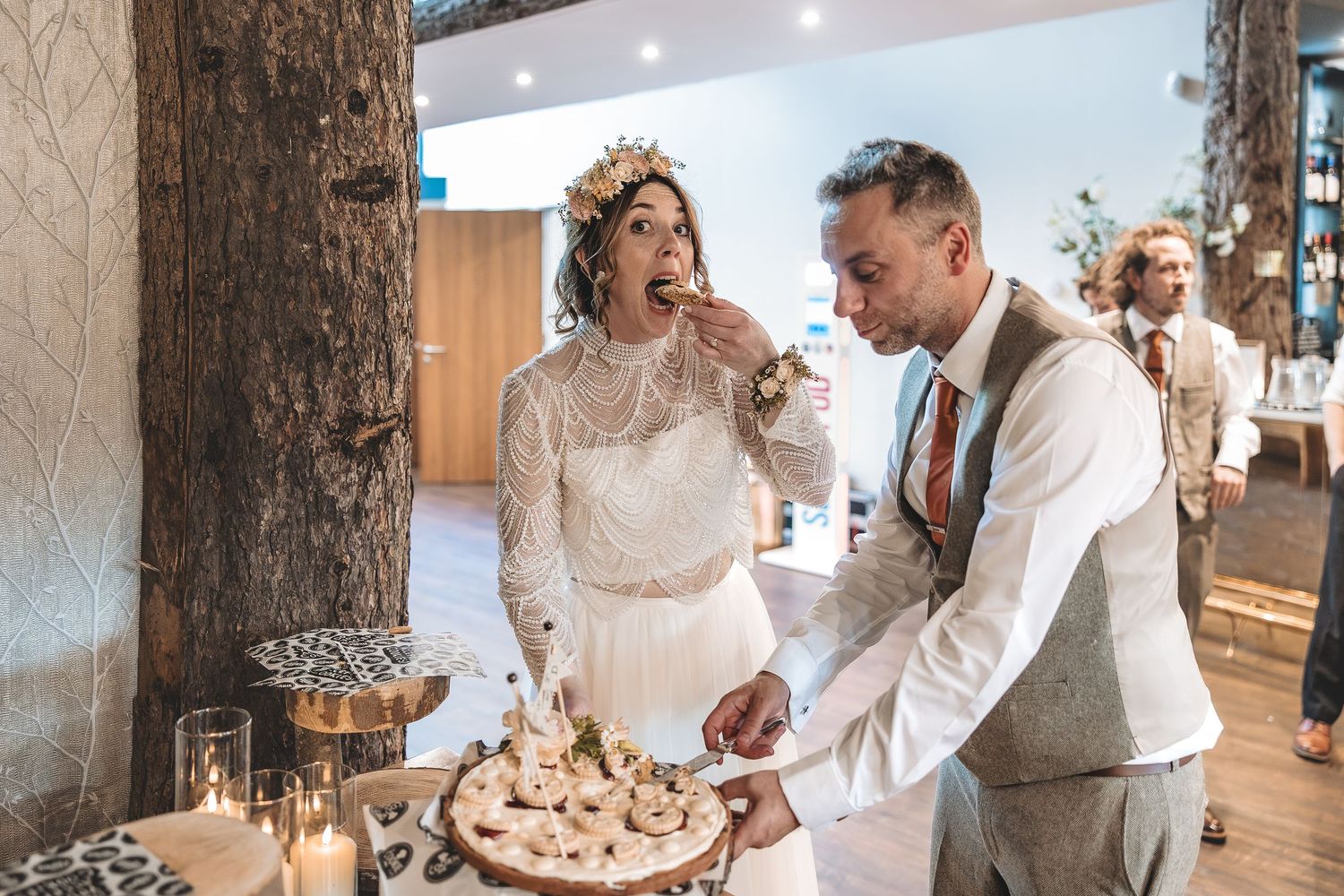 Documentary moment between couple during cake cutting on wedding day