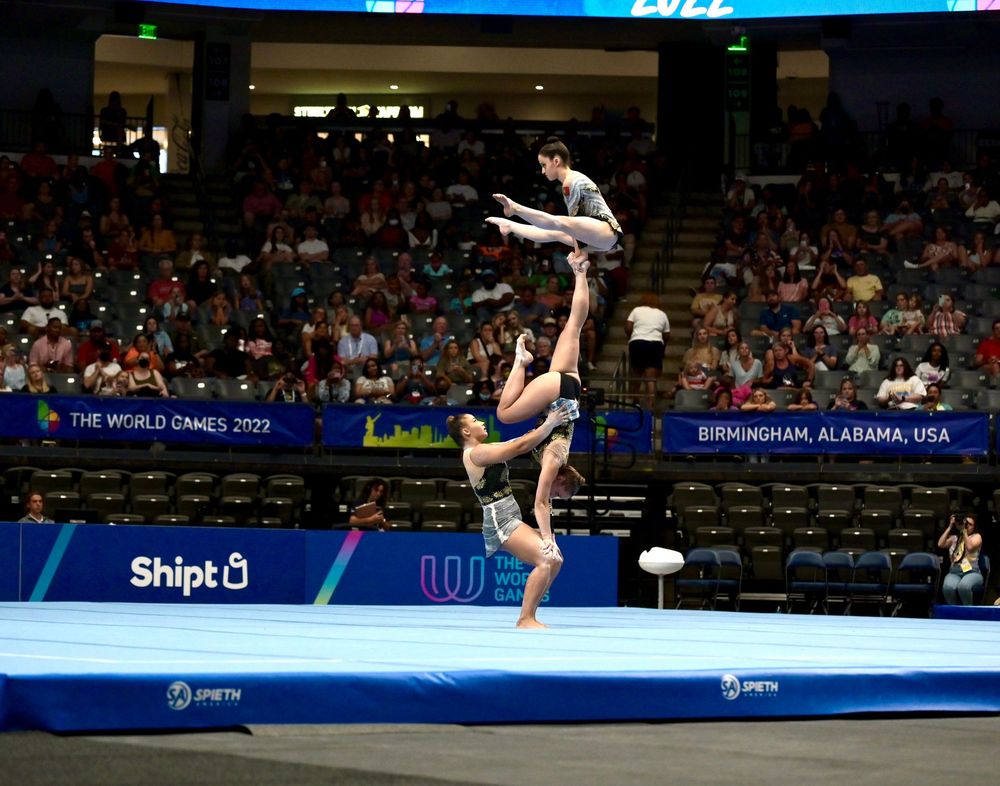 Acrobatic gymnasts perform a dynamic balance routine at The World Games 2023 in Birmingham, Alabama, USA.