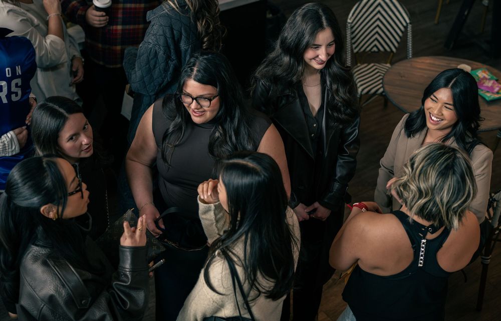 women gathering at corporate event
