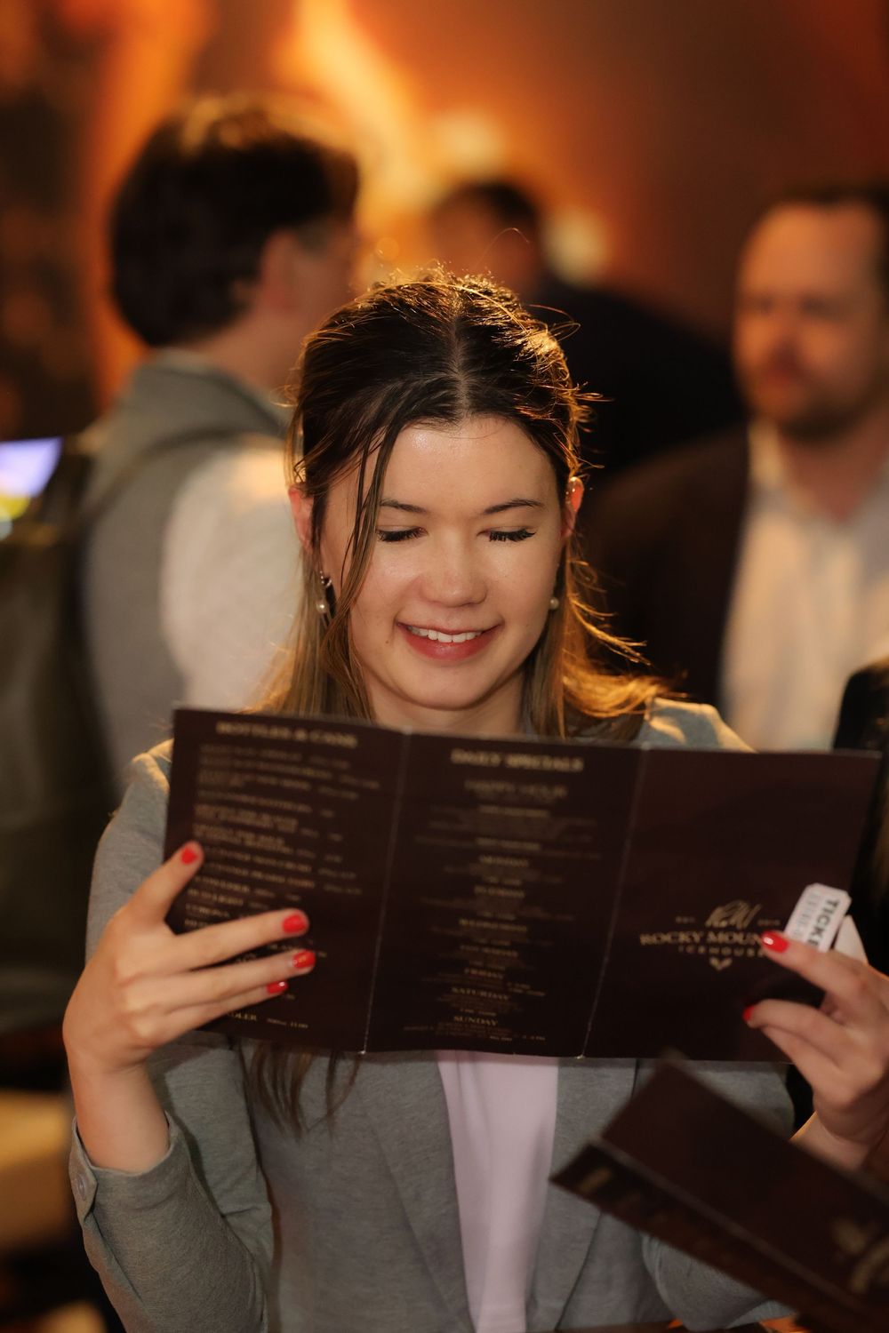 photographer capturing woman at corporate event