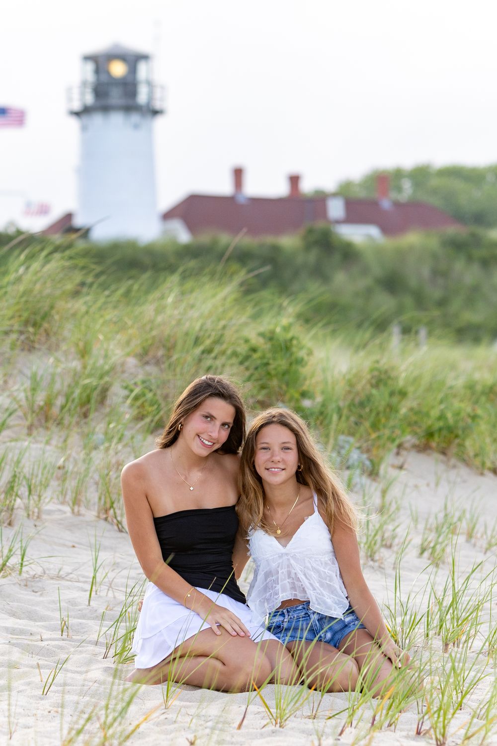 High school senior photos on Chatham Lighthouse Beach on Cape Cod for her senior yearbook portrait photos.  High school senior photographer.