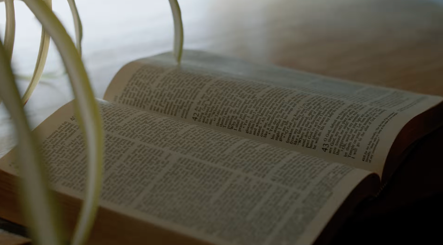 Documentary-style church video production setup with camera and audio gear