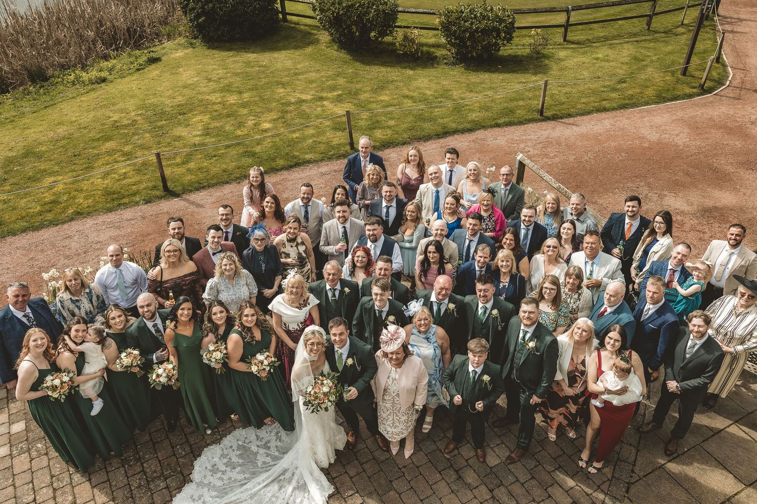 A full wedding group photo taken by a Documentary wedding photographer.