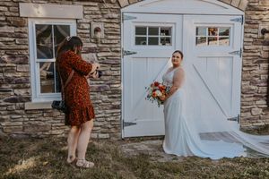 photographer capturing bridal detail shots