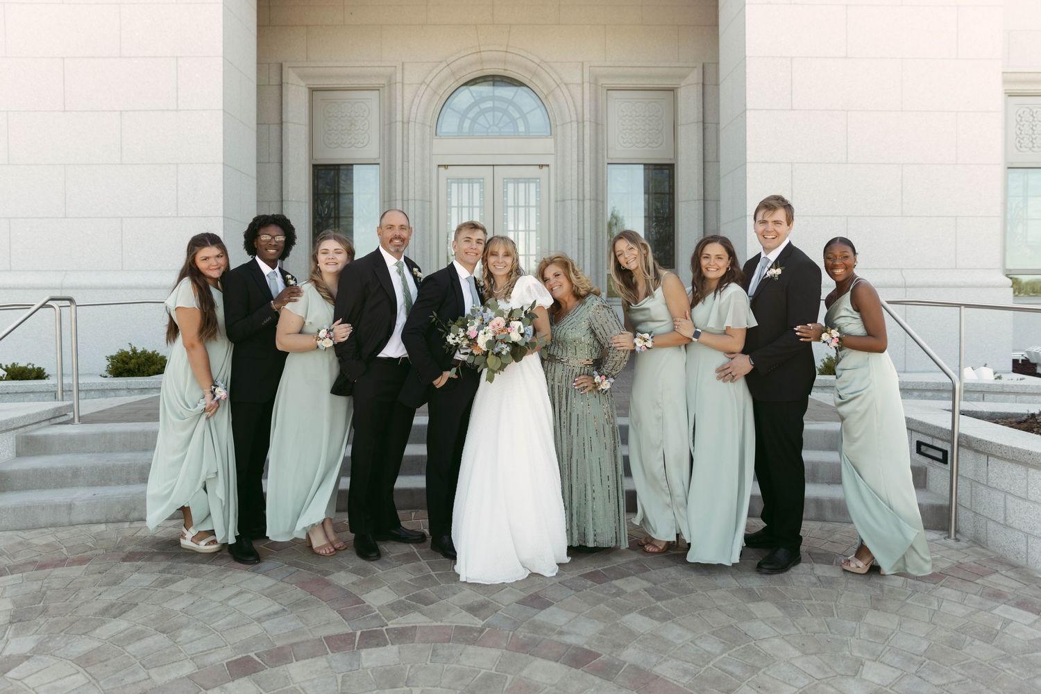 Smiling Bride and Groom using Blended Family Photo List on Wedding Day