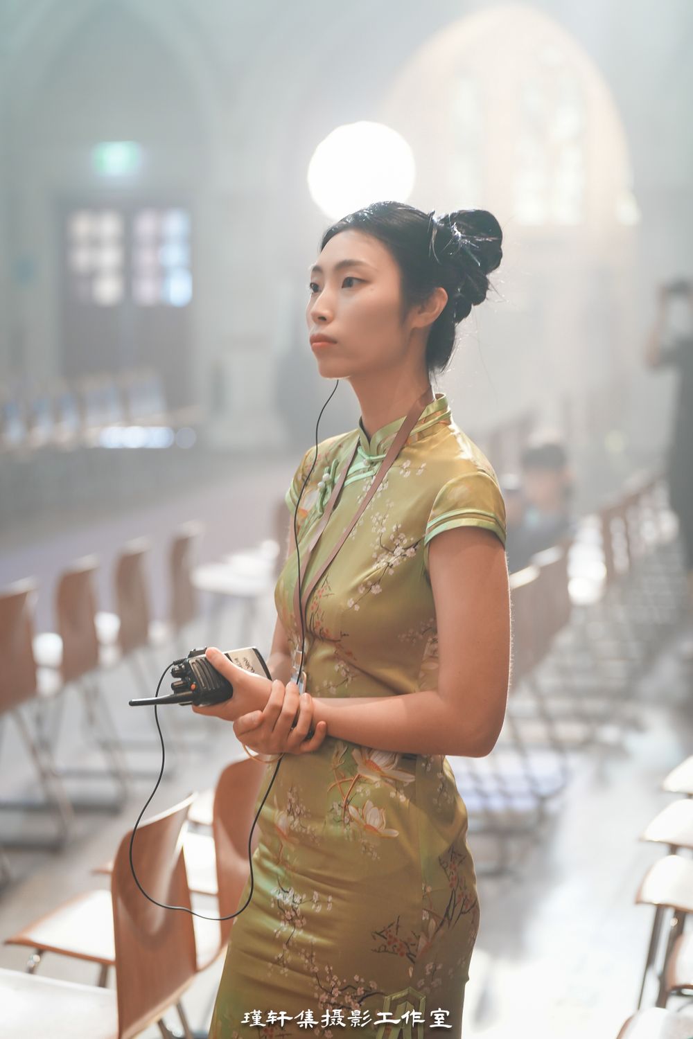 Group of elegant models showcasing beautiful Qipao dresses at a cathedral fashion event, by an Auckland photographer.Group of elegant models